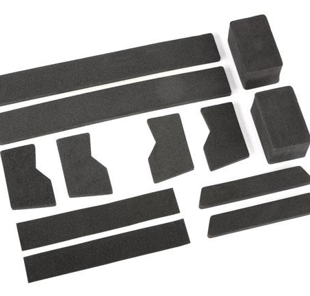 Almohadillas de espuma, compartimento de la batería