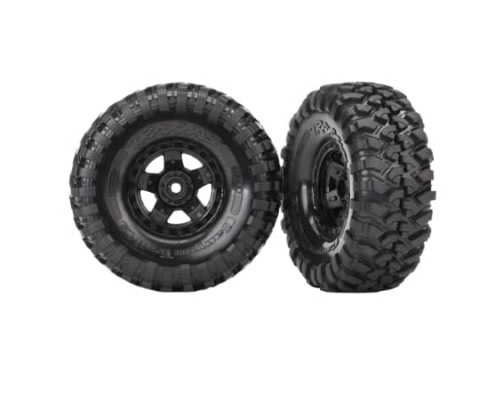 Llantas TRX-4® Sport negras de 1.9" con borde de bloqueo negro. Vienen ensambladas y listas para montar, con inserciones de espuma preinstaladas y neumáticos Canyon Trail de 1.9" x 4.6". Los neumáticos Canyon Trail cuentan con tacos de banda de rodadura profundos para una máxima tracción en terrenos difíciles, con inserciones de espuma optimizadas para senderos que ofrecen una experiencia de ascenso realista. Se venden en pares.